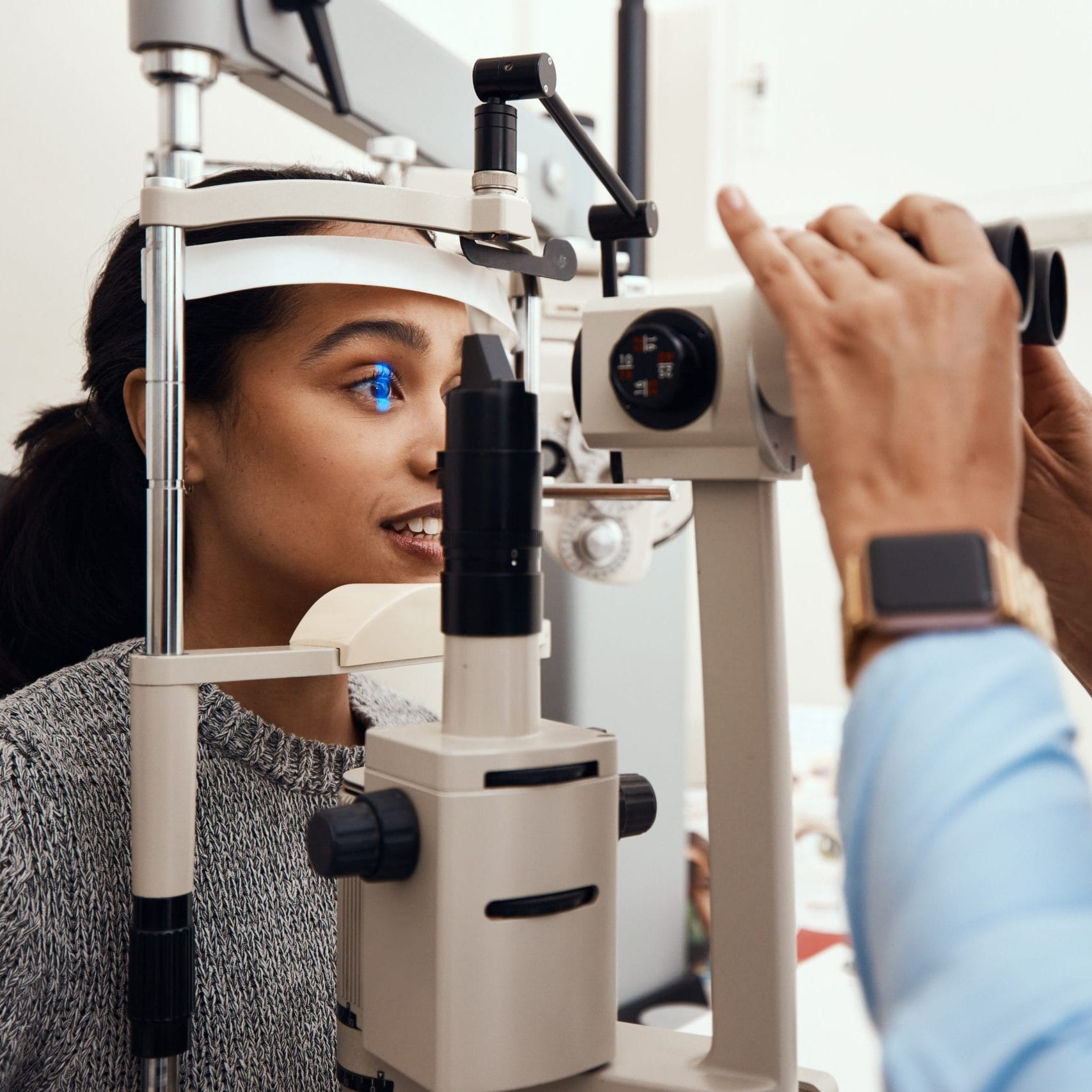 eye-test-exam-screening-with-ophthalmoscope-optometrist-optician-optometry-industry-young-woman-getting-her-eyes-tested-prescription-glasses-contact-lenses-vision